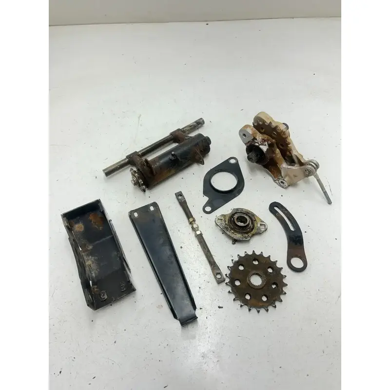 88 1988 Polaris Trail Boss 250 4x4 OEM Jack Shaft Carriers Sprocket Brake Mount